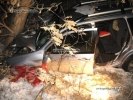 ДТП в Харькове: Mitsubishi Outlander столкнулся с Audi и врезался в дерево - погибла женщина - фото 1