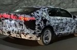 Mazda   Tesla Model 3