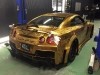 Крутой японский тюнинг: Nissan GT-R в золотых самурайских доспехах - фото 1