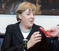 Suddeutsche Zeitung: кабинет Меркель поспешил в деле Opel
