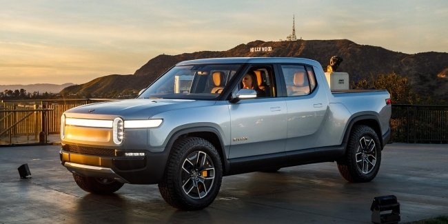 GM  Amazon    $1     Rivian