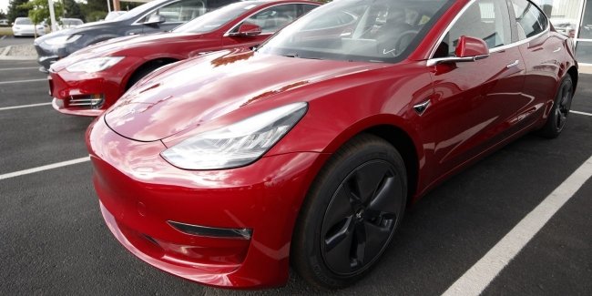  : $100.000    Tesla