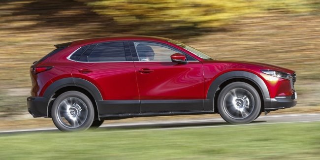  : Mazda    VW Tiguan