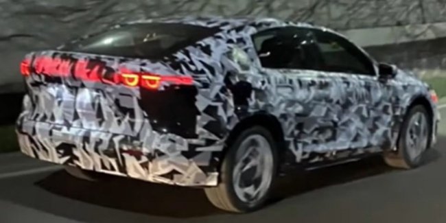 Mazda   Tesla Model 3