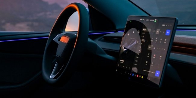 Tesla ������� ��������� ��������� Grok ��� ���� � �����