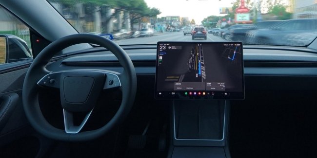 ������� ������������ iOS 26 �� iPhone ����� ��������� �������� Tesla