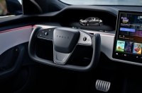  Tesla  ز     