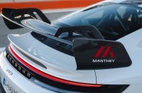 Porsche AG ������ ���� ������ � Manthey Racing GmbH